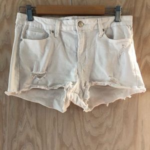 Tilly’s mid rise white shorts with distressing